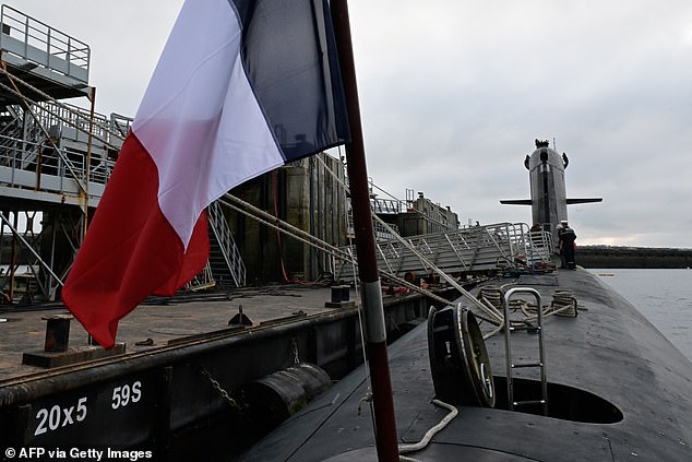 The nuclear attack submarine "Emeraude" is depicted at Brest Naval Base, western France