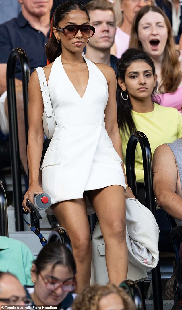 Maria Thattil turned heads as she took time out to attend the Australian Open at Melbourne Park (pictured) on Sunday