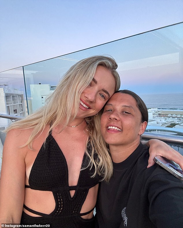 Kerr (pictured right with her fiancé Kristie Mewis) has been accused of alleged racial harassment