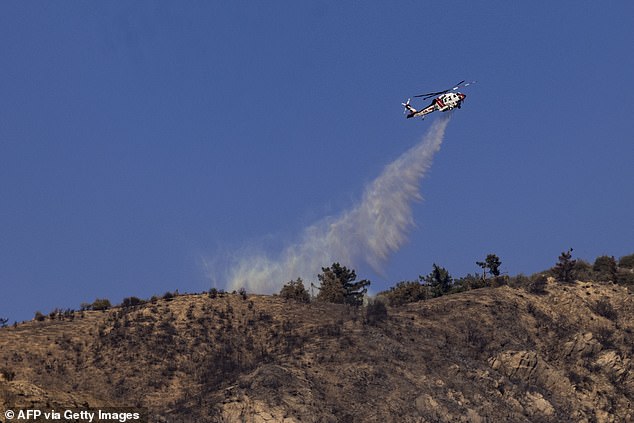 Firefighters in the affected area are overwhelmed by the fast-spreading fires as the state's response is closely watched