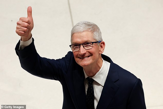 Apple is leading a thrilling three-way battle to cross the $4 trillion mark for the first time. In the photo: Apple CEO Tim Cook