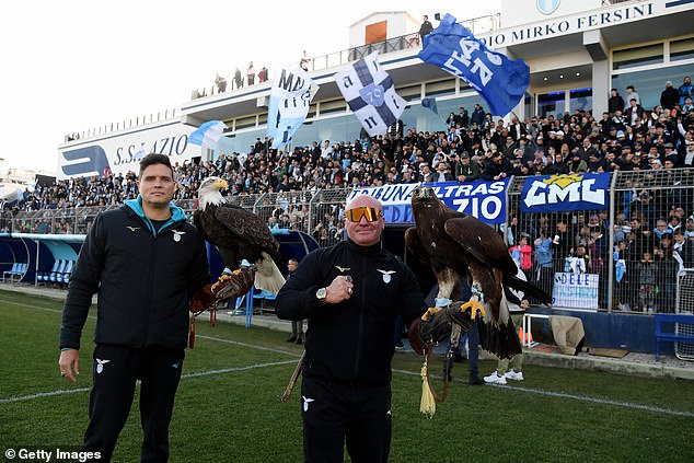 Bernabe pictured himself holding the eagle before a Lazio training session in front of their supporters