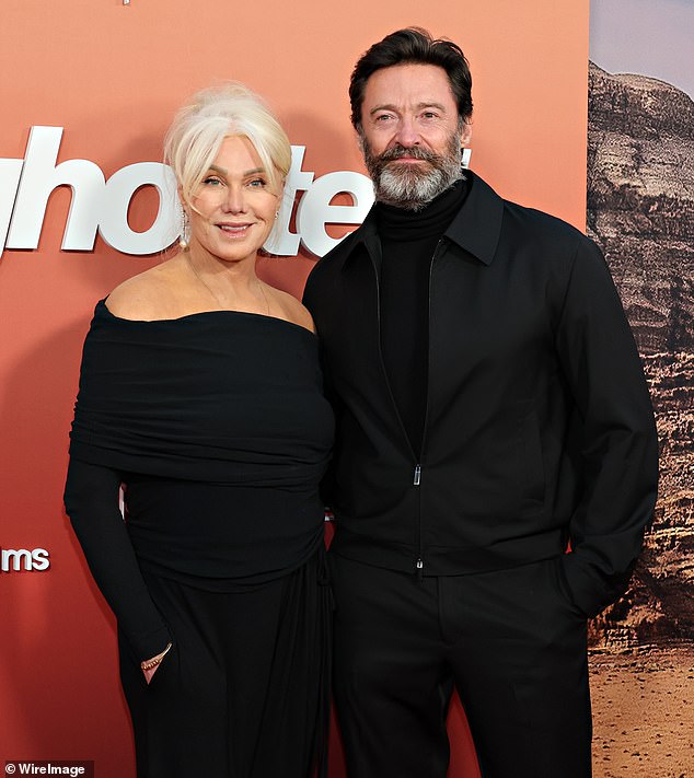 Fans have called out the Wolverine star's bizarre and awkward pash in the parking lot, with many offering their support to his ex-wife Deborra-Lee Furness (pictured)