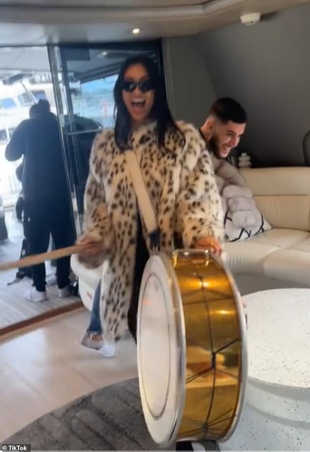 Videos showed birthday celebrants driving around the city in luxury cars and drinking champagne on a yacht. Mrs. Eslami is depicted beating a drum on the yacht during the celebration