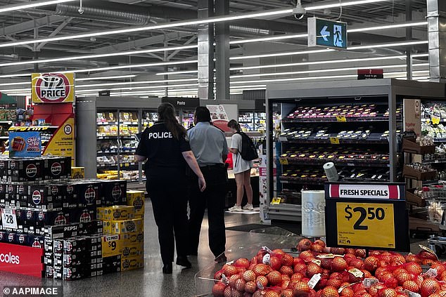 Police returned to the Coles supermarket where the alleged stabbing took place on Tuesday