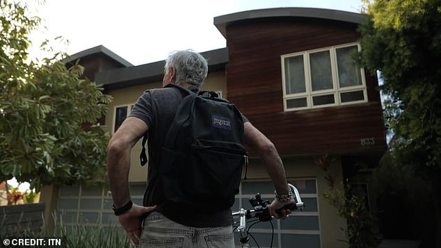 Mr Ashofteh stood outside his home, which was unaffected by the LA wildfires