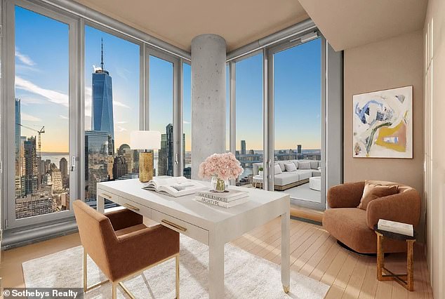 An office space in the room with One World Trade Center, seen outside the window