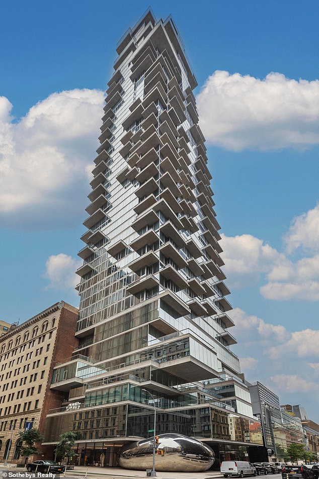 The building - also known as the 'Jenga Tower' - was designed by renowned architects Herzog & de Meuron and the residential structure also features a sculpture by Anish Kapoor