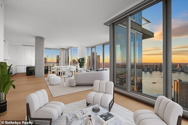 The four-bedroom, four-and-a-half-bath residence offers views of the Hudson River and the Freedom Tower, as well as views from the north, west and south sides of the home