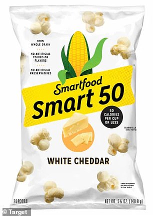 Smart 50 White Cheddar Popcorn from Target gets a score of 98 in the database. The data shows that a 100 gram serving contains 464 calories and ten food additives