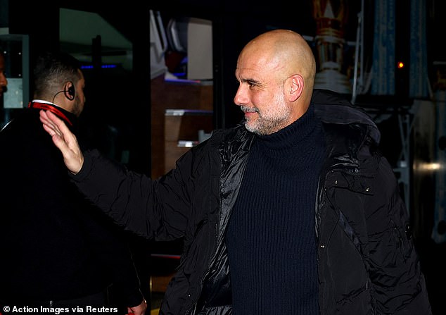 The Man City manager was mobbed by fans as he arrived at the Gtech Community Stadium