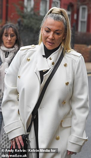 Rachel Halliwell at the inquest into the death of her daughter, Samina Halliwell, at Bootle Town Hall near Liverpool with her sister Clare Halliwell (black coat, red dress)