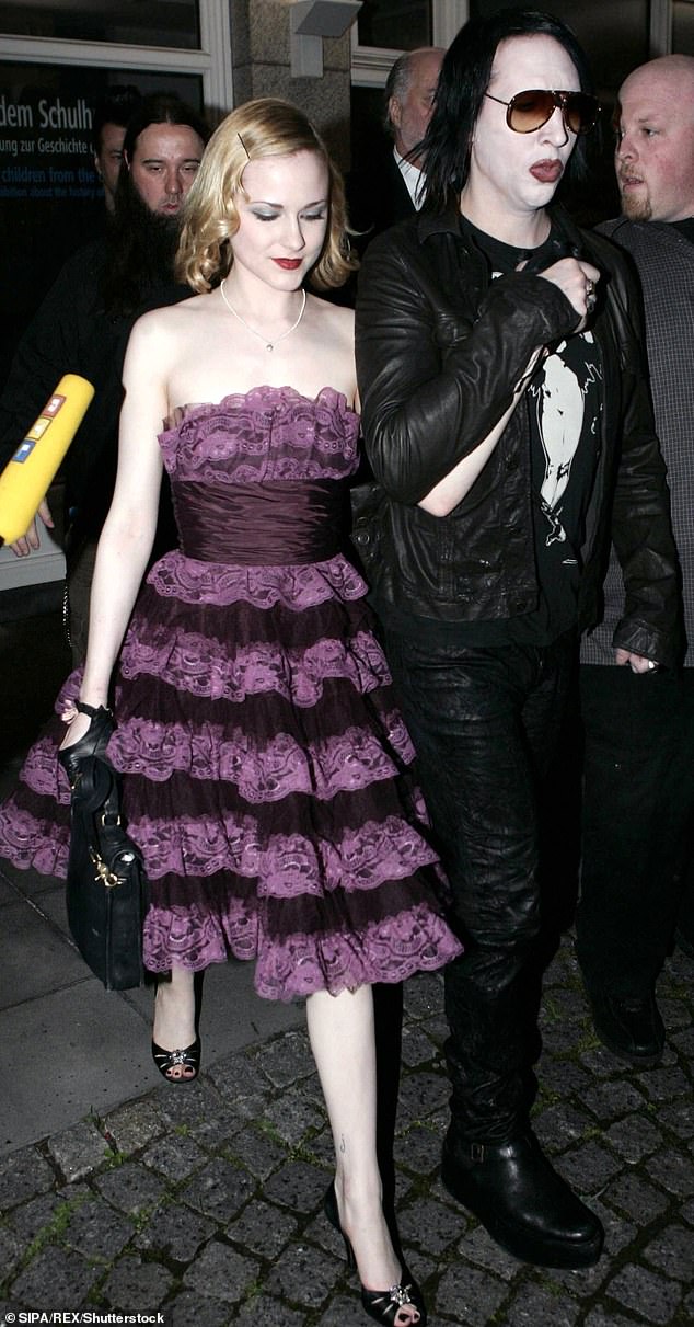 Evan Rachel Wood and Marilyn Manson are pictured at an art exhibition in Germany in 2007