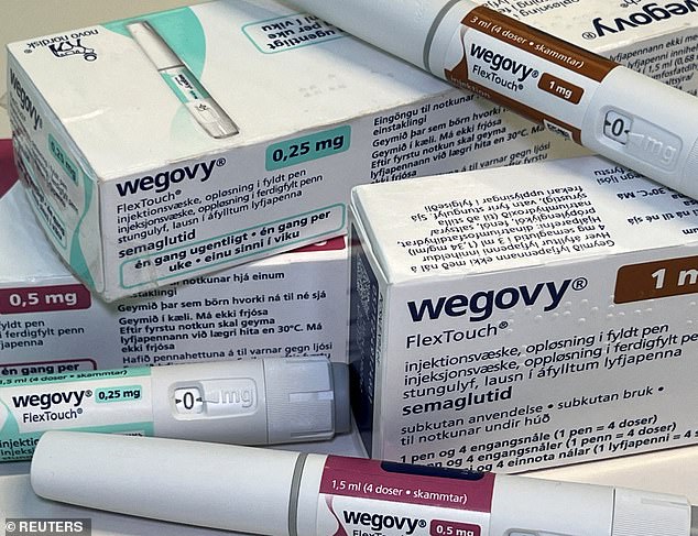 In this photo illustration, injection pens and boxes of the slimming drug Wegovy from Novo Nordisk are shown