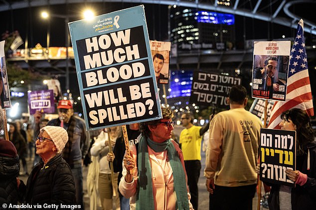 The demonstrators carried photos of their relatives and banners reading 