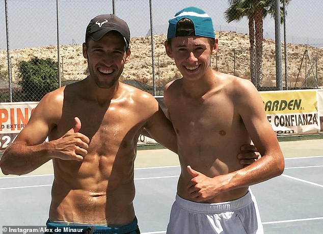 De Minaur (right) is pictured in 2016, when he was still filling out his frame