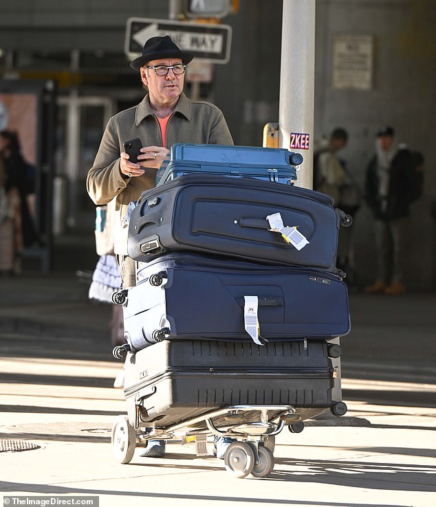 He was driving with three check-ins and one carry-on when he went outside to wait for his ride