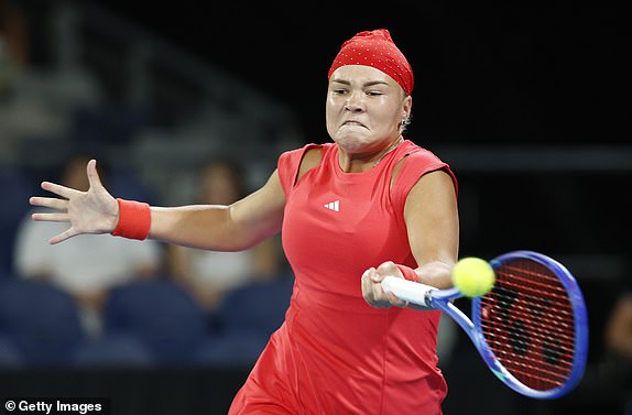 MELBOURNE, AUSTRALIA – JANUARY 15: Diana Shnaider plays a forehand against Ajla Tomljanovic of Australia in the Women's Singles Second Round match during day four of the 2025 Australian Open at Melbourne Park on January 15, 2025 in Melbourne, Australia. (Photo by Daniel Pockett/Getty Images)