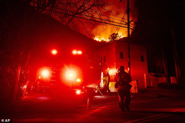 Firefighters have been set up to defend homes threatened by the Palisades Fire