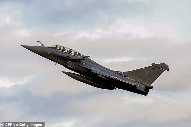 File image shows a French Air Force Rafale B standard F4 fighter jet flying as part of NATO's Enhanced Air Policing (eAP) mission in the Baltics, on December 17, 2024