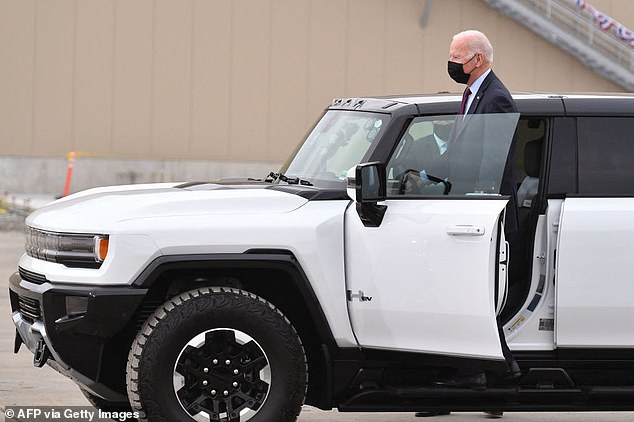 President Biden's Inflation Reduction Act (IRA) provided $3 billion over ten years to make the Postal Service fully electric (photo: Biden test drive a GMC Hummer EV)