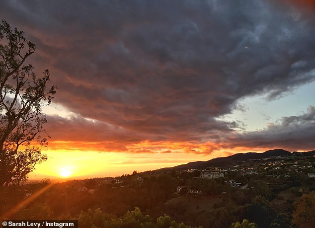 The 38-year-old actress, who is the daughter of Eugene Levy and has a recurring role on his hit series Schitt's Creek, posted a message lamenting the heartbreaking loss along with an image of what appeared to be the Pacific Palisades.