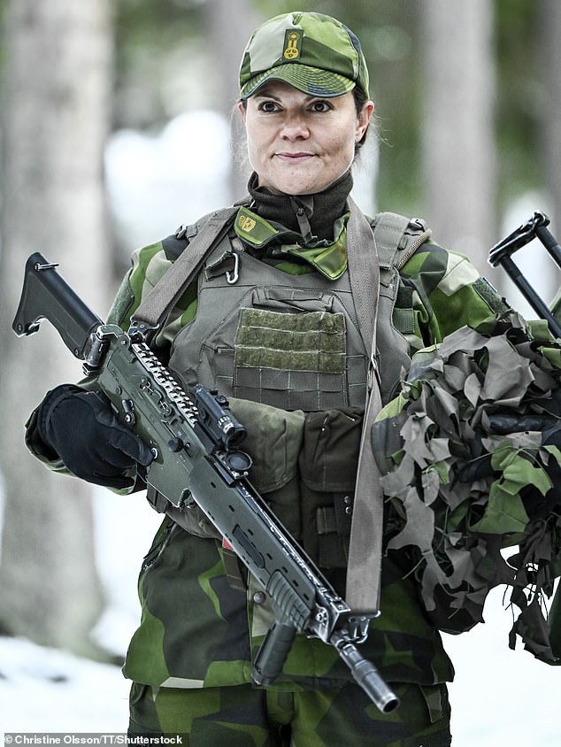 Crown Princess Victoria of Sweden gets stuck in a training exercise with the 1st Marine Regiment in Stockholm in November