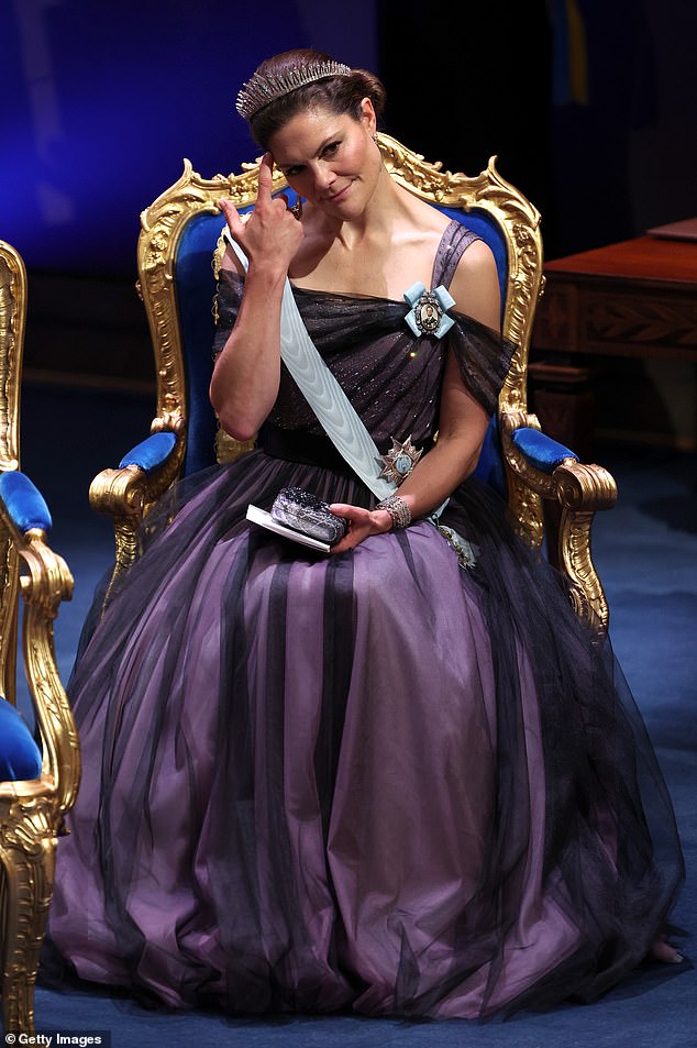 Crown Princess Victoria of Sweden presented herself elegantly in a deep purple ball gown at the 2024 Nobel Prize Ceremony