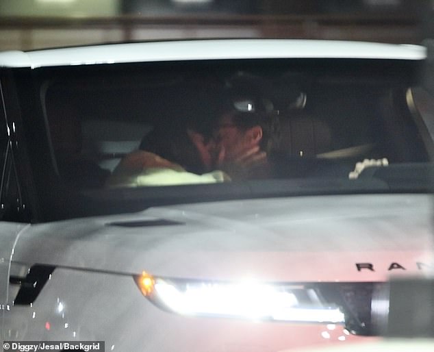 Deborra-Lee's appearance at the Australian Open comes just hours after Hugh was exposed kissing Sutton Foster for the first time since their relationship. Hugh and Sutton, 49, appeared deeply in love and couldn't keep their hands off each other as they kissed repeatedly while in the car at a San Fernando In-N-Out. (Pictured)