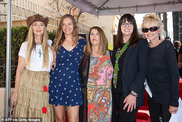 Michelle (far right) was seen at a ceremony for late bandmate Cass Elliot's posthumous star on the Hollywood Walk of Fame with (from left) daughter Chynna Phillips, stepdaughter Bijou Phillips, Elliot's daughter Owen Elliot-Kugell and stepdaughter Mackenzie Phillips in 2022