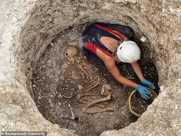 The Dorset remains, which included 40 Iron Age people, revealed six males who did not fit the family tree and eight who did not belong to the female line of the family tree. Pictured: Excavation of a Late Iron Age Durotriges burial at Winterborne Kingston