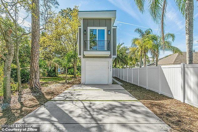 The two-story house was built by developer John Atkins, who was determined to build on the small lot despite fierce opposition from neighbors.