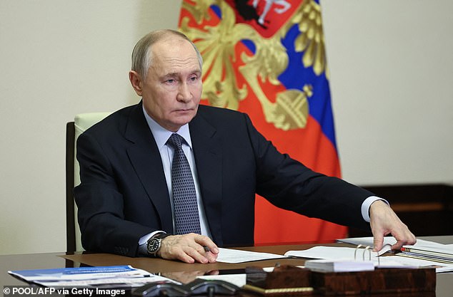 Russian President Vladimir Putin is seen hosting a video conference on January 15