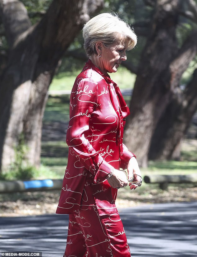 In her latest look, the homegrown fashionista looked radiantly red in a chic suit