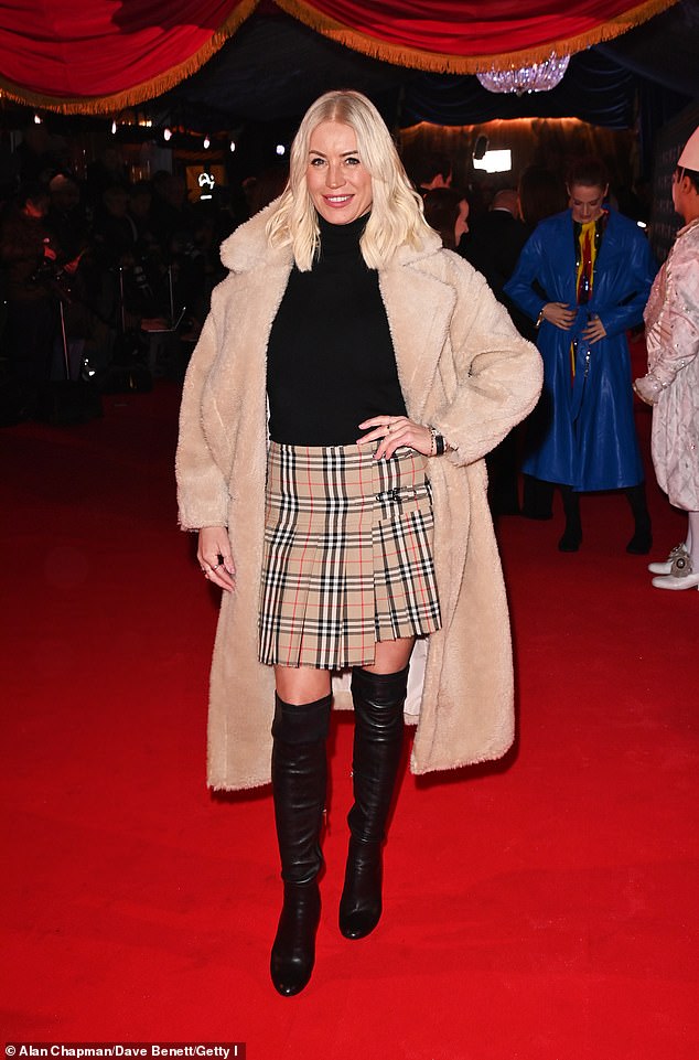 Denise Van Outen looked typically stylish in a Burberry mini skirt and faux fur coat