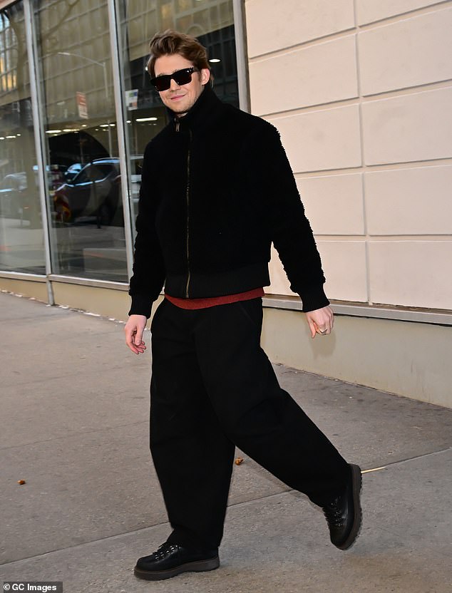 Alwyn pictured Wednesday (pictured outside CBS Studio after filming The Drew Barrymore show) is currently promoting his film The Brutalist