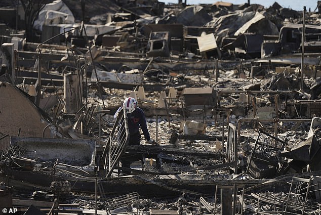 The fires have killed at least 24 people and destroyed more than 12,000 structures, causing damage estimated at $40 billion.