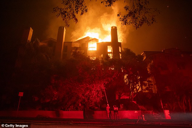 The death toll from the LA fires currently stands at 25, and more than 100,000 acres have been scorched by the unprecedented flames; the Palisades Fire photographed on January 9