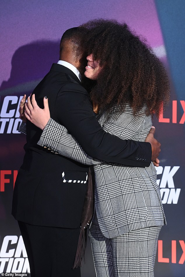 At one point, the father-daughter duo stopped to share a warm hug for the cameras