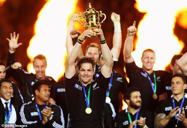 Former All Blacks skipper Richie McCaw (pictured hosting the World Cup after New Zealand's 2011 victory) flew the couple in a helicopter to the ceremony