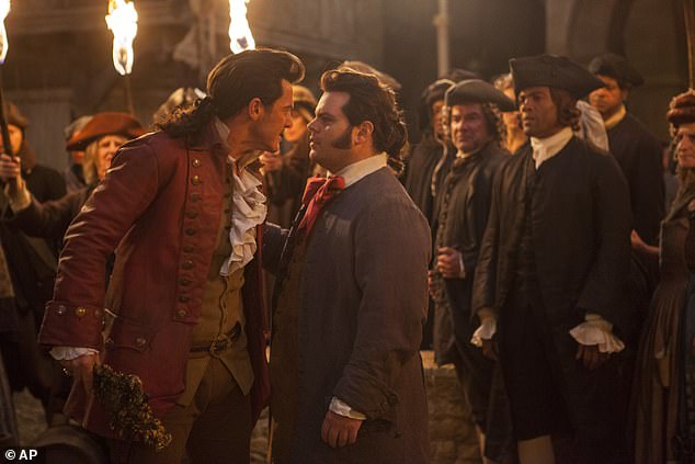 Gad's character is friends with the Gaston character played by Luke Evans (L) in the film