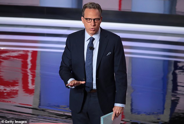 Young claims a November 2021 segment on CNN's The Lead with Jake Tapper (pictured) falsely portrayed him as an 