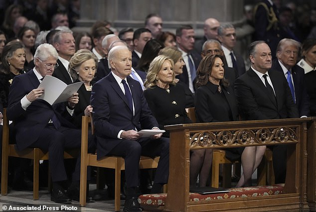 Michelle Obama was the only spouse absent from President Jimmy Carter's funeral on Thursday. President Joe Biden, first lady Jill Biden, Vice President Kamala Harris, second gentleman Doug Emhoff, former President Bill Clinton, former first lady Hillary Clinton, former President George W. Bush, former first lady Laura Bush, former President Barack Obama, former President and President-elect Donald Trump, former first lady Melania Trump, former Vice President Al Gore and former Vice President Mike Pence were all in attendance