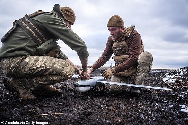 Ukrainian military personnel prepare a reconnaissance drone for deployment in the Pokrovsk area, Ukraine on January 14