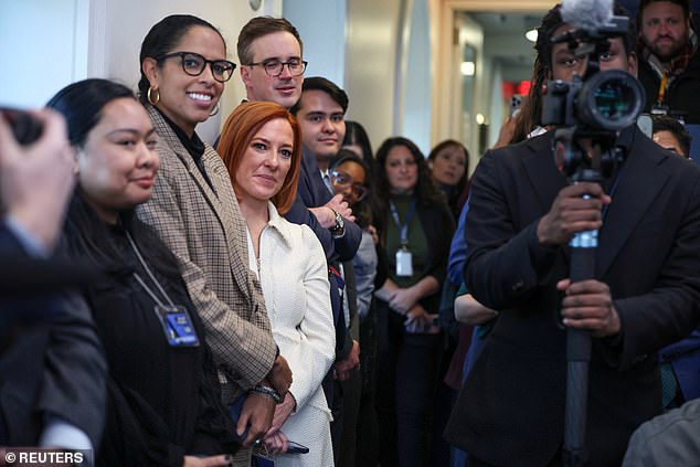 Former White House Press Secretary Jen Psaki (center in white) attends White House Press Secretary Karine Jean-Pierre's final press conference on the Biden administration