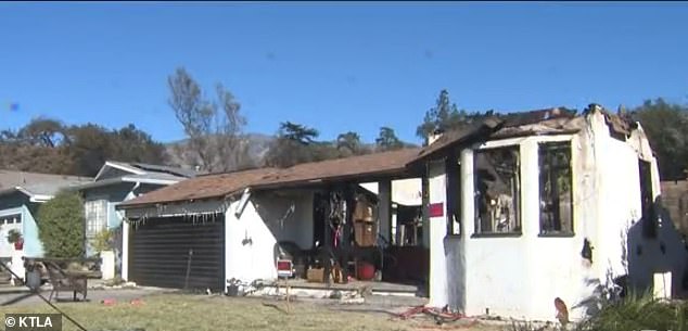 The house can be seen after the fire was extinguished. A GoFundMe started by her son Aaron Miller has received more than $27,000 of its $150,000 goal