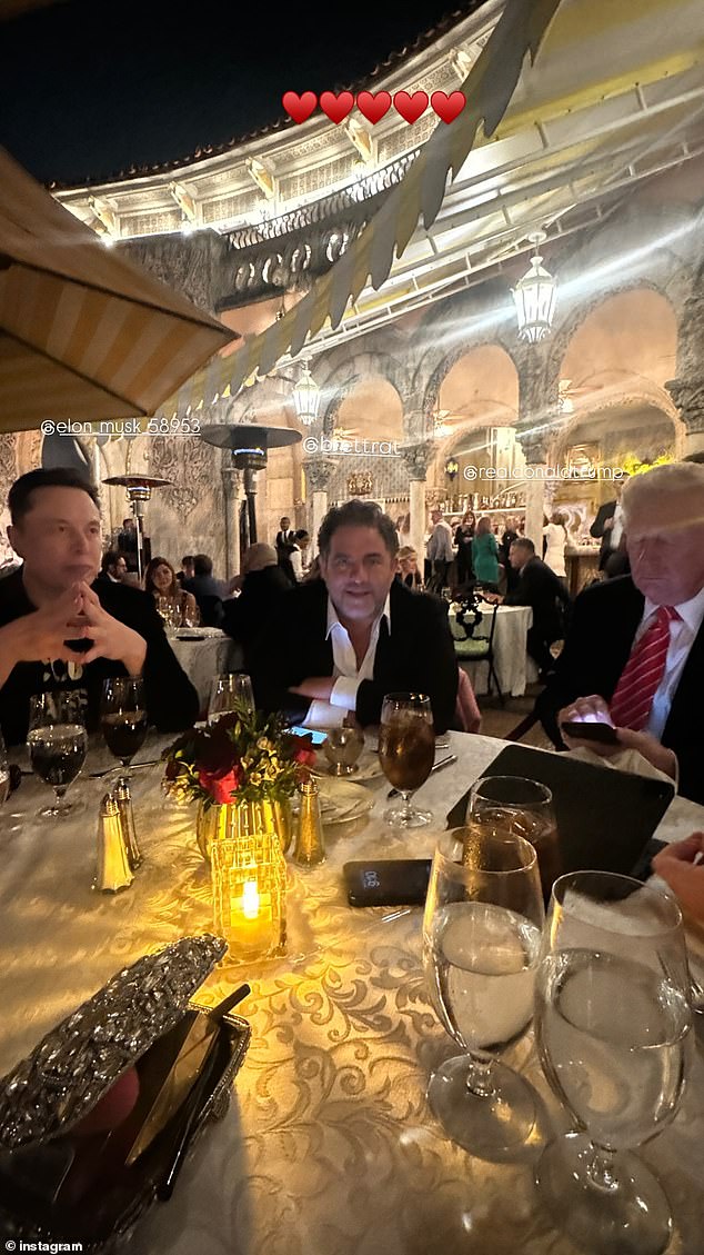 Another part of the video shows Elon Musk (L) and Ratner enjoying the evening, while the president-elect appears to be using a mobile device (pictured)