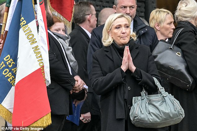 Marine Le Pen thanks the crowd gathered outside her father's memorial service this morning