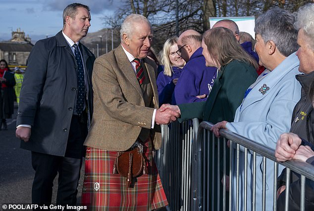 Many others shook hands with the king as he tried to greet everyone who had braved the cold Scottish weather to see him in Clackmannanshire on Thursday.