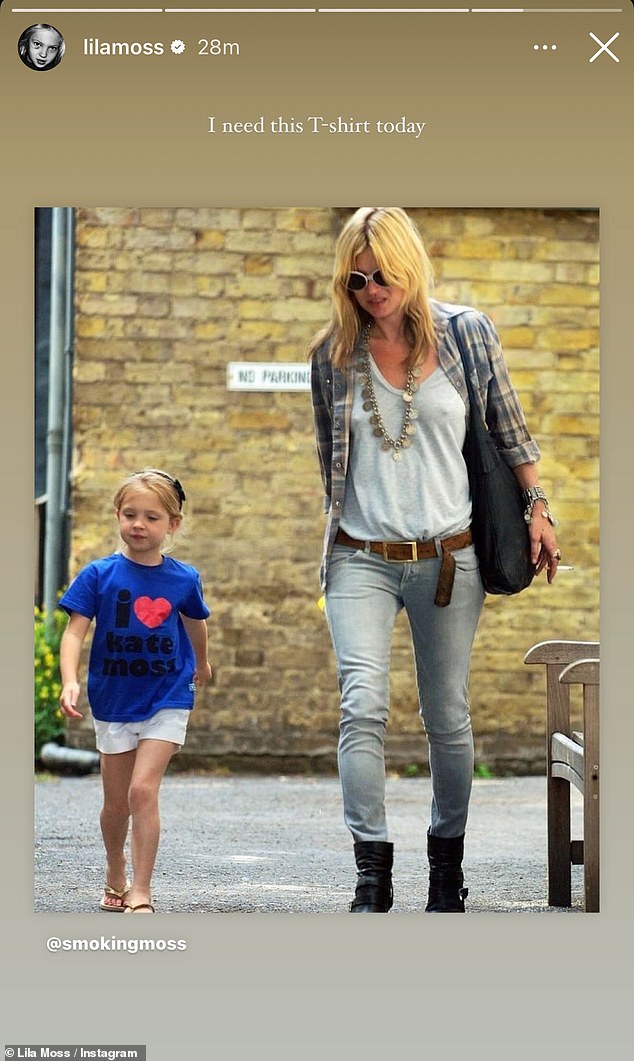 In another photo, the catwalk star was seen walking down the street with young Lila, wearing a striking blue T-shirt with the words 'I heart Kate Moss' printed on the front